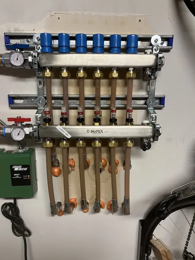 Plumber performing Water Heater Repair at a residential property in Weiser